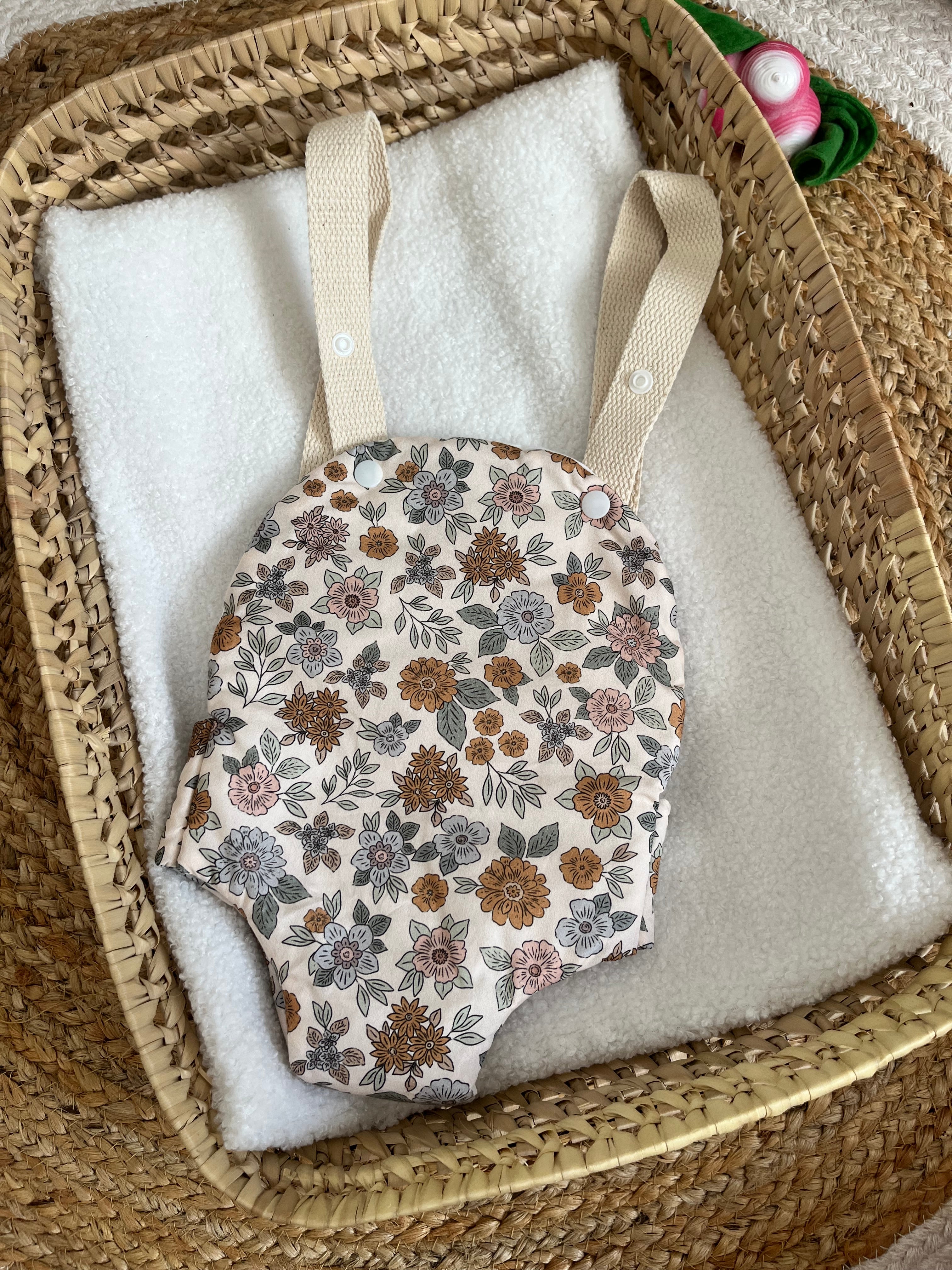 Porte bébé /poupée fleur