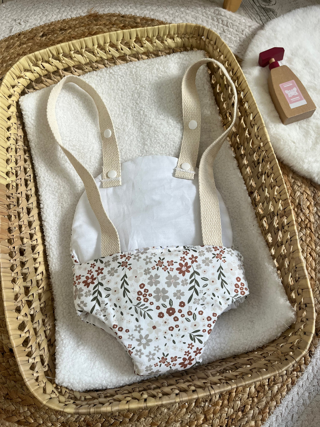 Porte bébé /poupée fleur