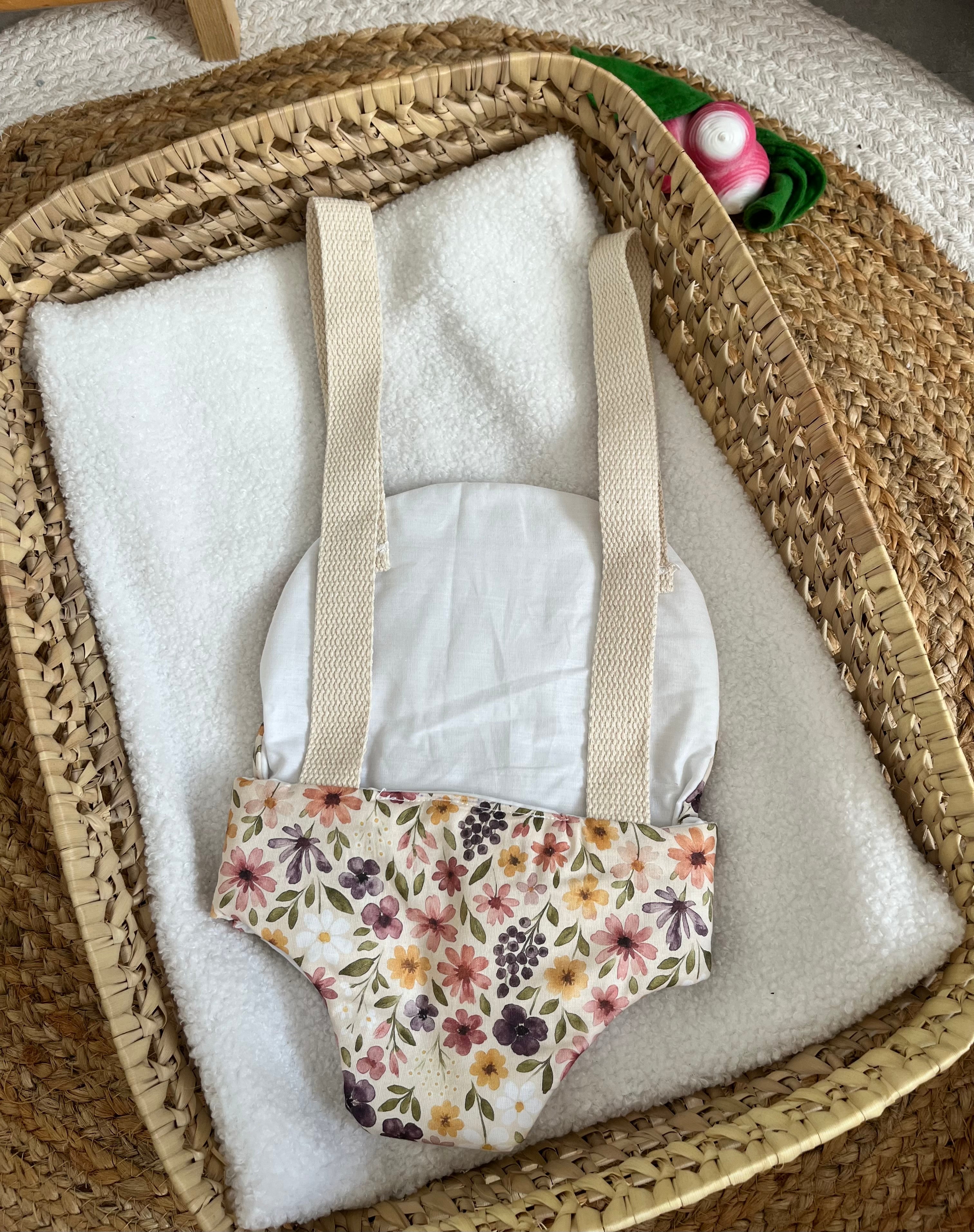 Porte bébé /poupée fleur