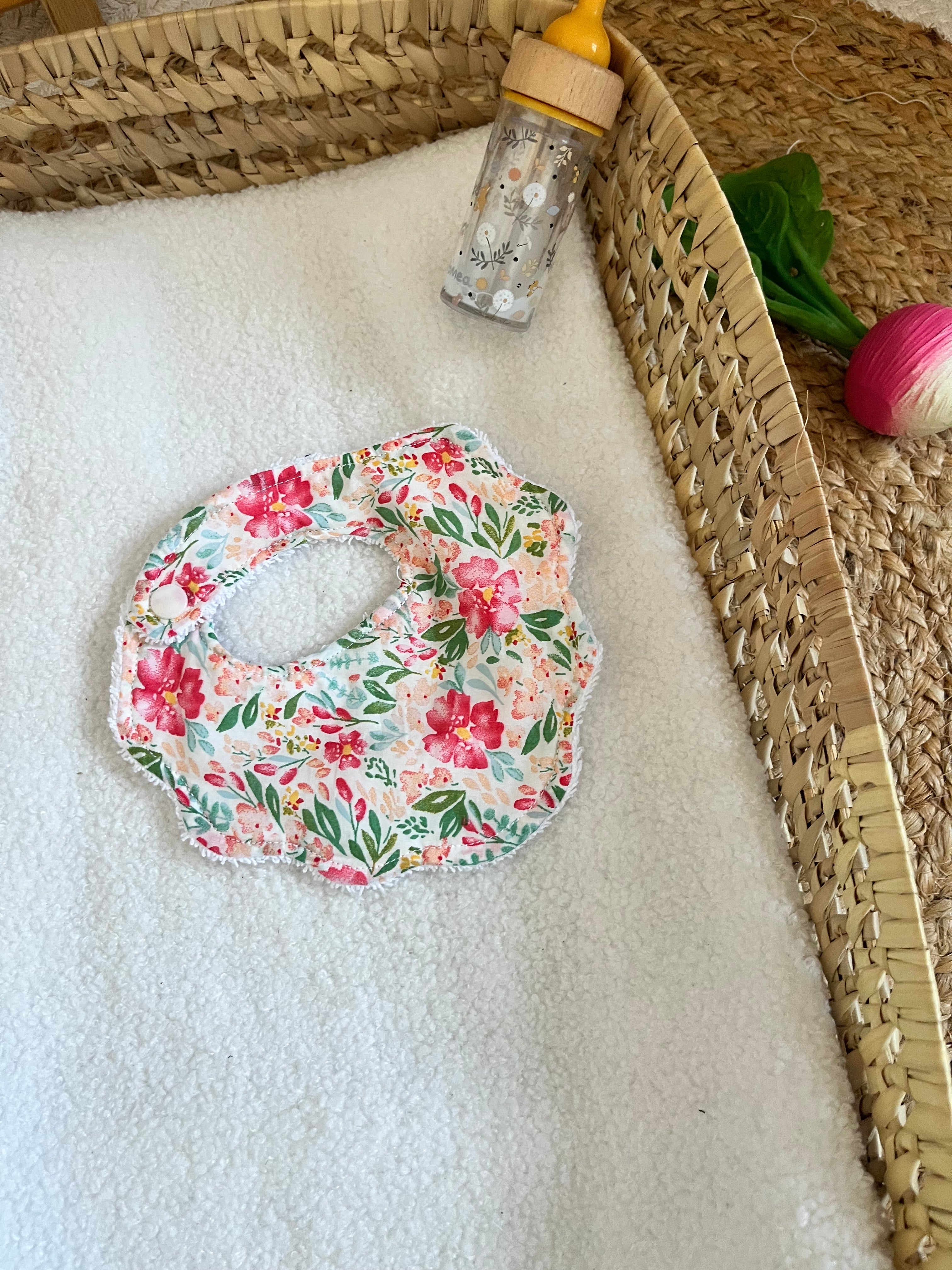 Bavoir poupée fleur